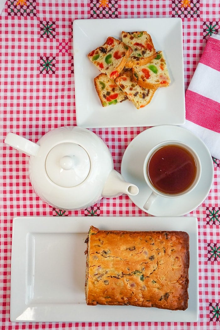 Fruitcake Loaf Cake overhead photo of sliced cake with tea service