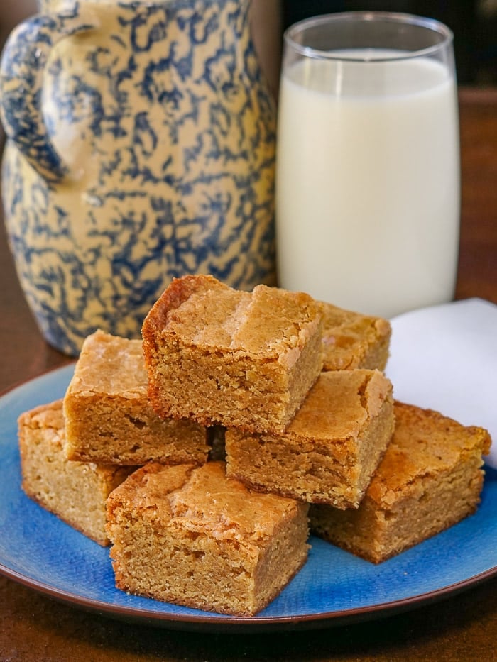 The Best Blondies with glass of milk in background