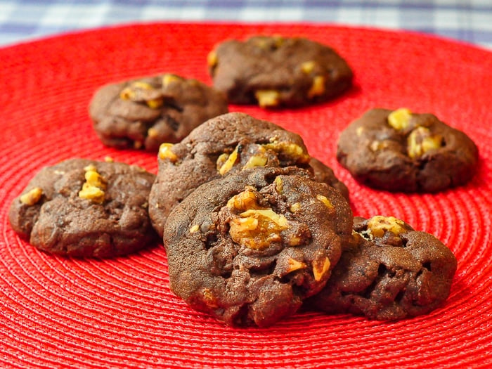 Walnut Brownie Cookies on a red background