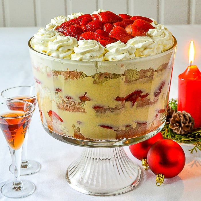 Strawberries and Cream Sherry Trifle square cropped image of trifle in clear glass pedestal bowl
