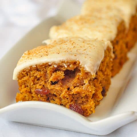 Ginger Raisin Cake Bars close up featured image of a single cake square