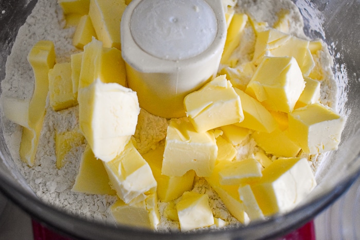 Add butter to flour