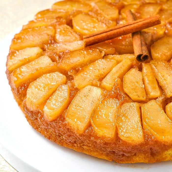 Apple Upside Down Cake close up photo of a single slice on a white plate 2