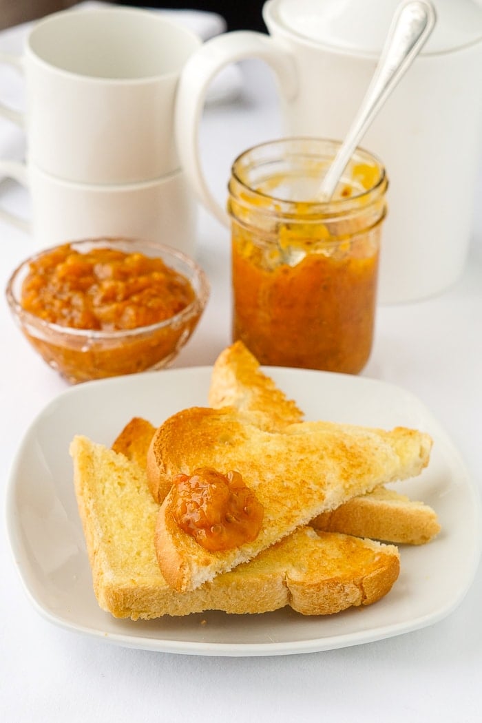 Bakeapple Jam on toast with white coffee service in background