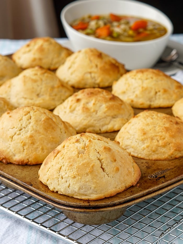 Biscuit Muffin Bread still in the pan with soup in the background