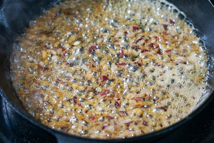 Cook the onions and garlic in the butter to soften