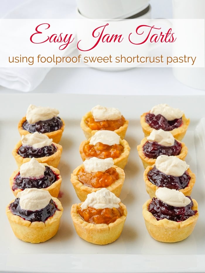 Jam Tarts topped with thick cream photo with title text added for Pinterest