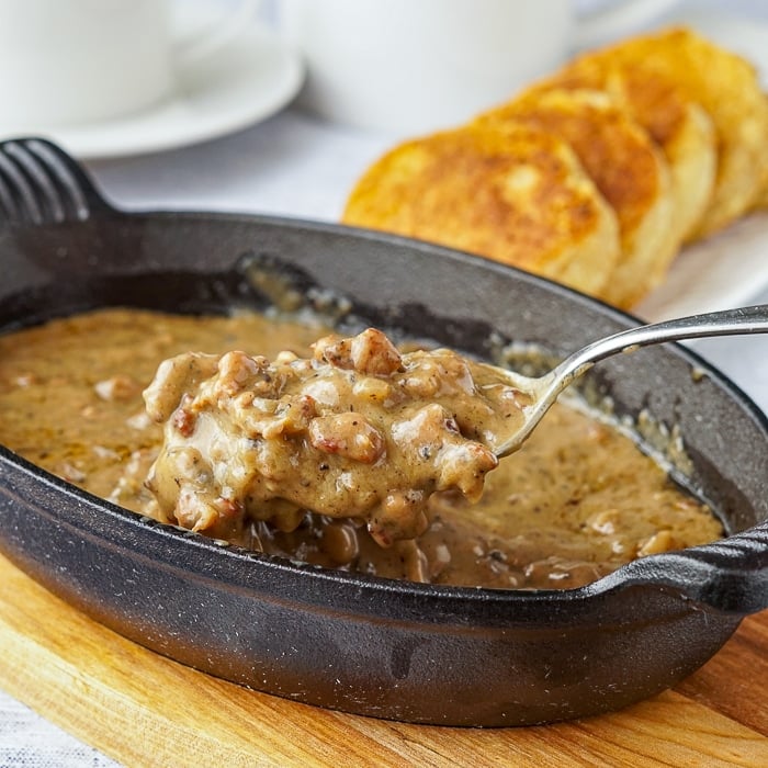 Sausage gravy served a cast iron serving dish