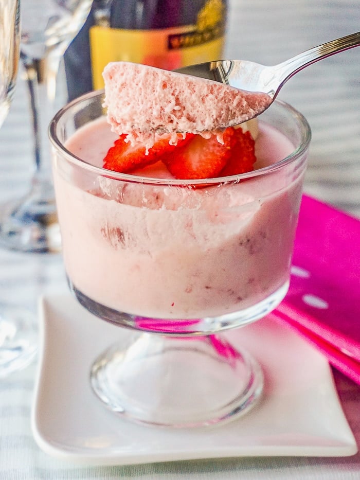 Strawberry Marshmallow Mousse photo of a spoon scooping the mouse out of a single serving dish
