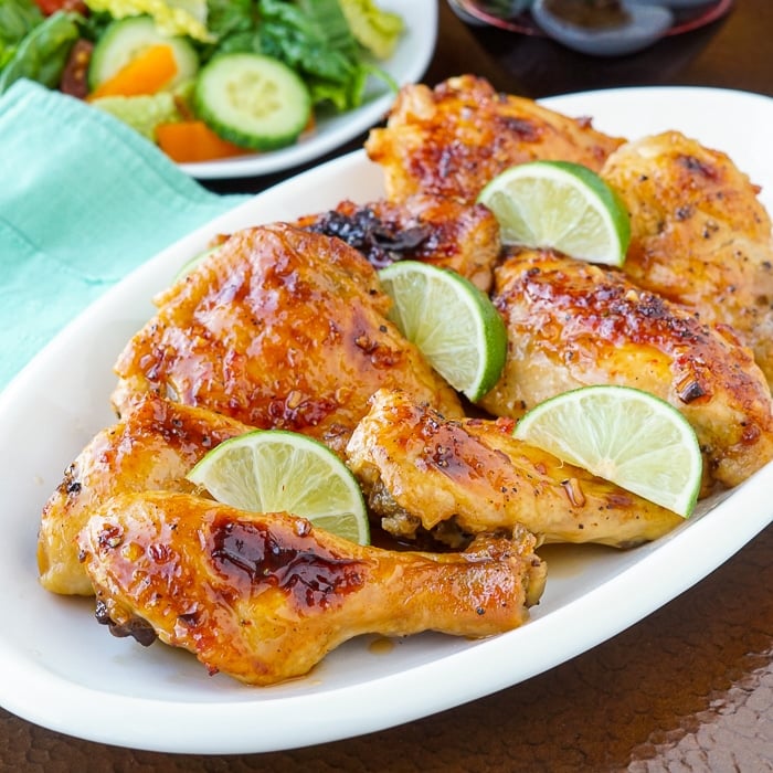 Sweet Chili Lime Chicken on a white serving platter