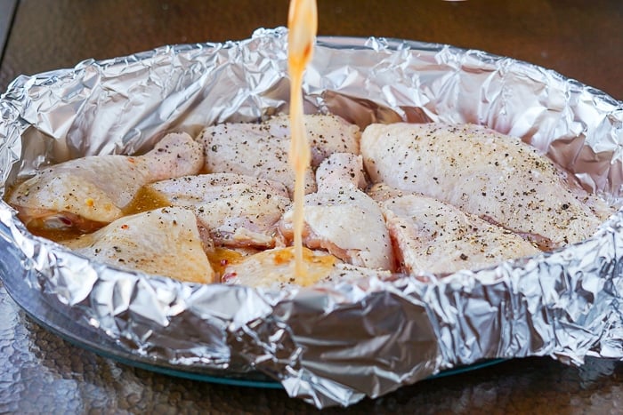 Sweet Chili Lime Chicken photo of sauce being poured on