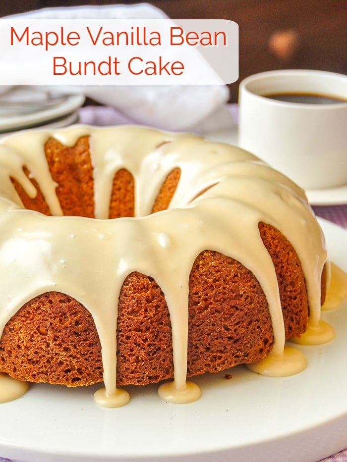 Maple Vanilla Bean Bundt Cake photo of uncut cake on a white plate with title text added for Pinterest