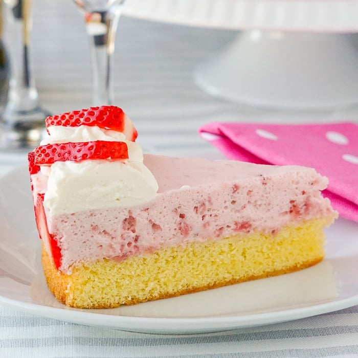 Strawberry Marshmallow Mousse Cake close up photo of a single slice