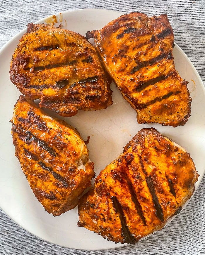 Peri peri sauce on grilled centre loin pork chops.