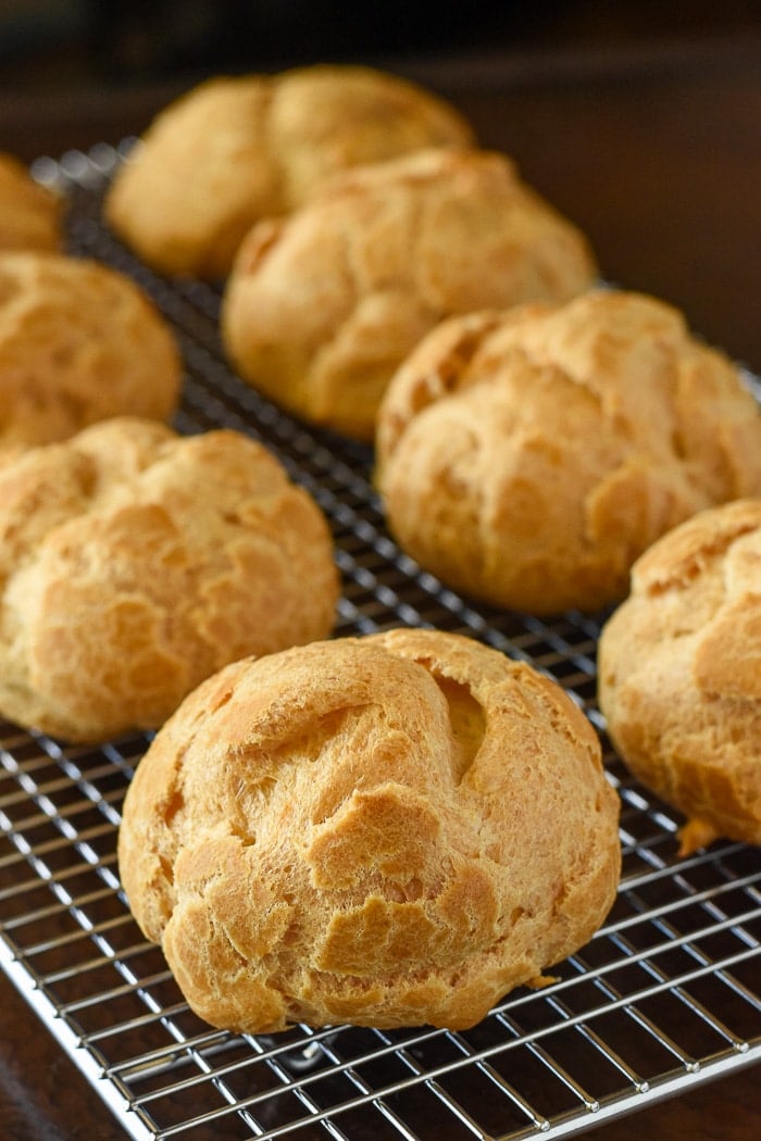 Choux Pastry Profiteroles cooling on a wire rack