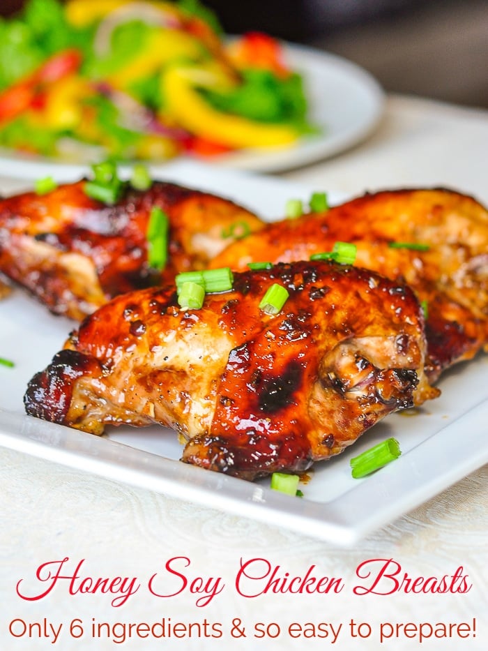 Honey Soy Chicken Breasts shown on white plate with title text added for Pinterest