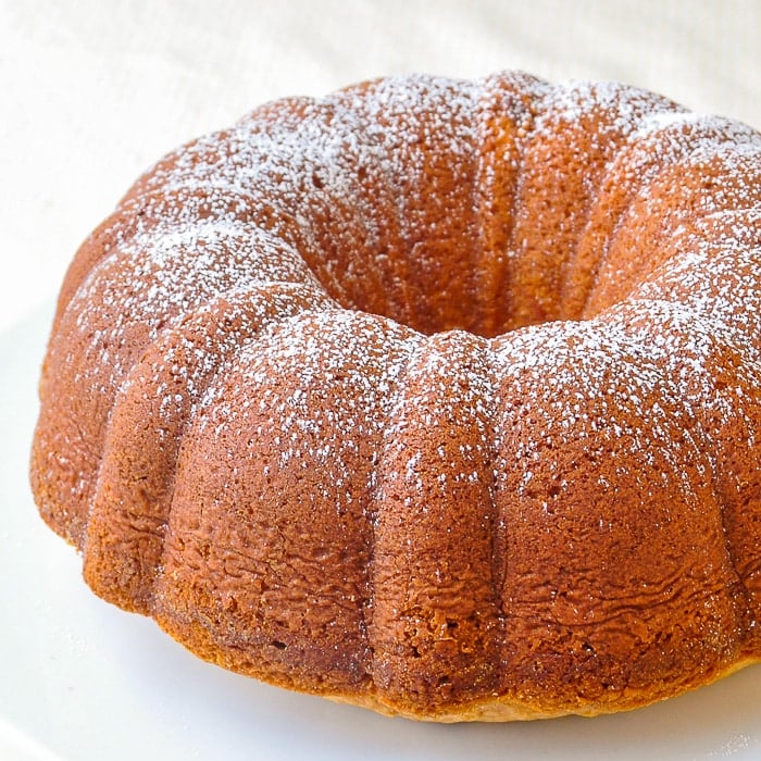 Close up photo of uncut Vanilla Pound Cake baked in a bundt pan