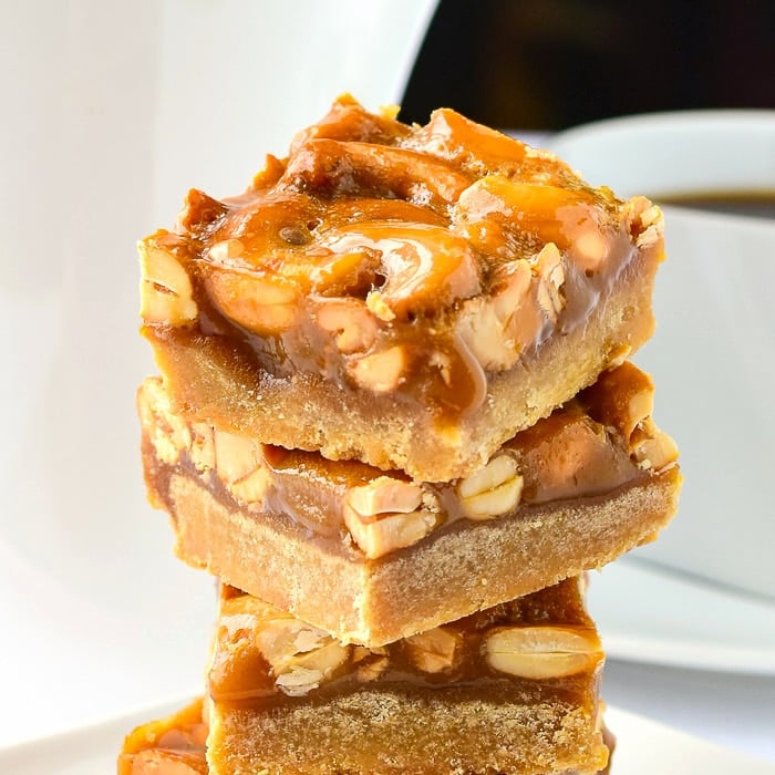 Honey Cashew Cookie Bars close up photo of stacked cookie bars