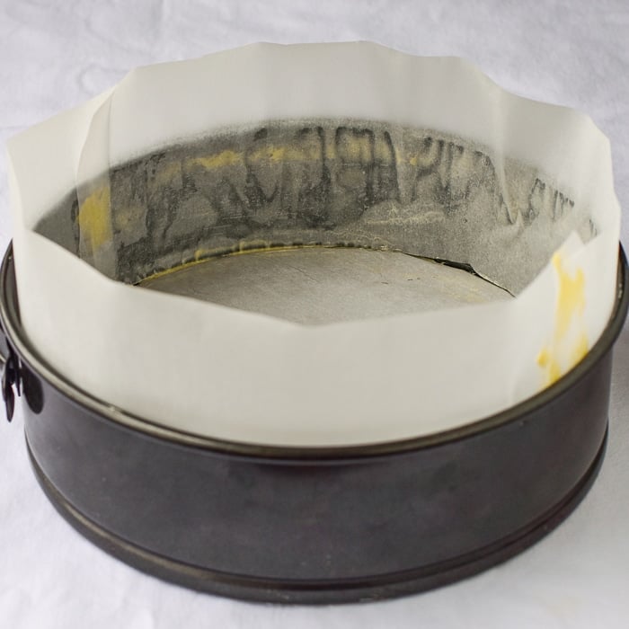 Spring form pan lined with parchment paper