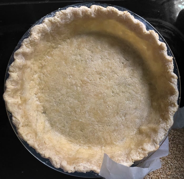 Pastry crust after teh first 15 minutes, baking weights removed.