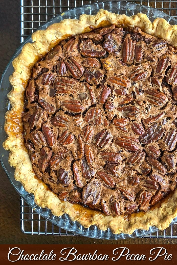 Chocolate Bourbon Pecan Pie photo of uncut pie with title text added for Pinterest