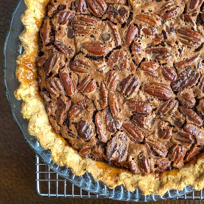 Chocolate Bourbon Pecan Pie square cropped featured image of uncut pie