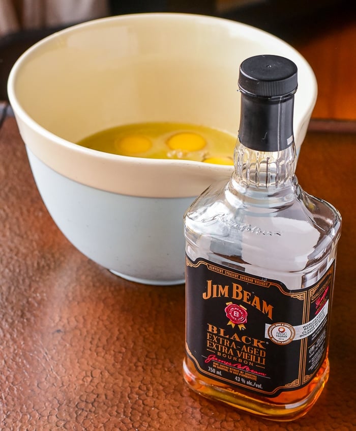 Photo of Jim Beam bourbon next to a mixing bowl
