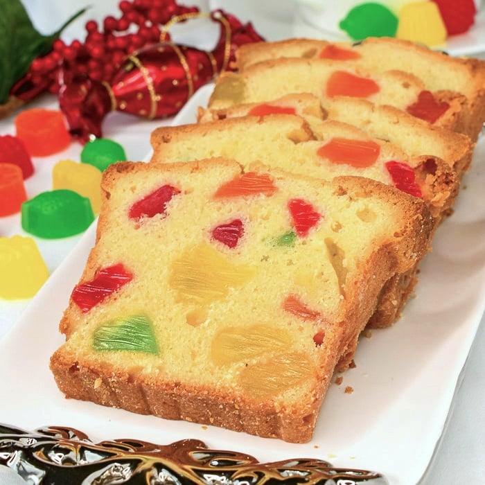 Gumdrop Cake photo of several cake slices on a white and silver platter