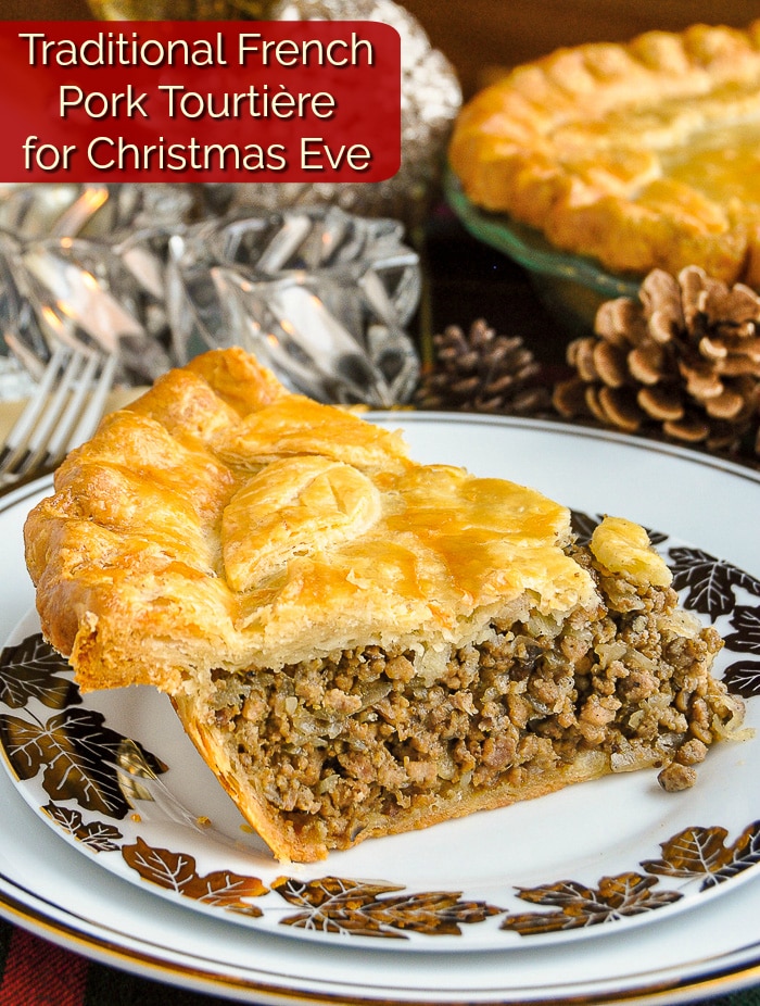 Christmas Tourtière slice on a gold and white plate with title text added for Pinterest