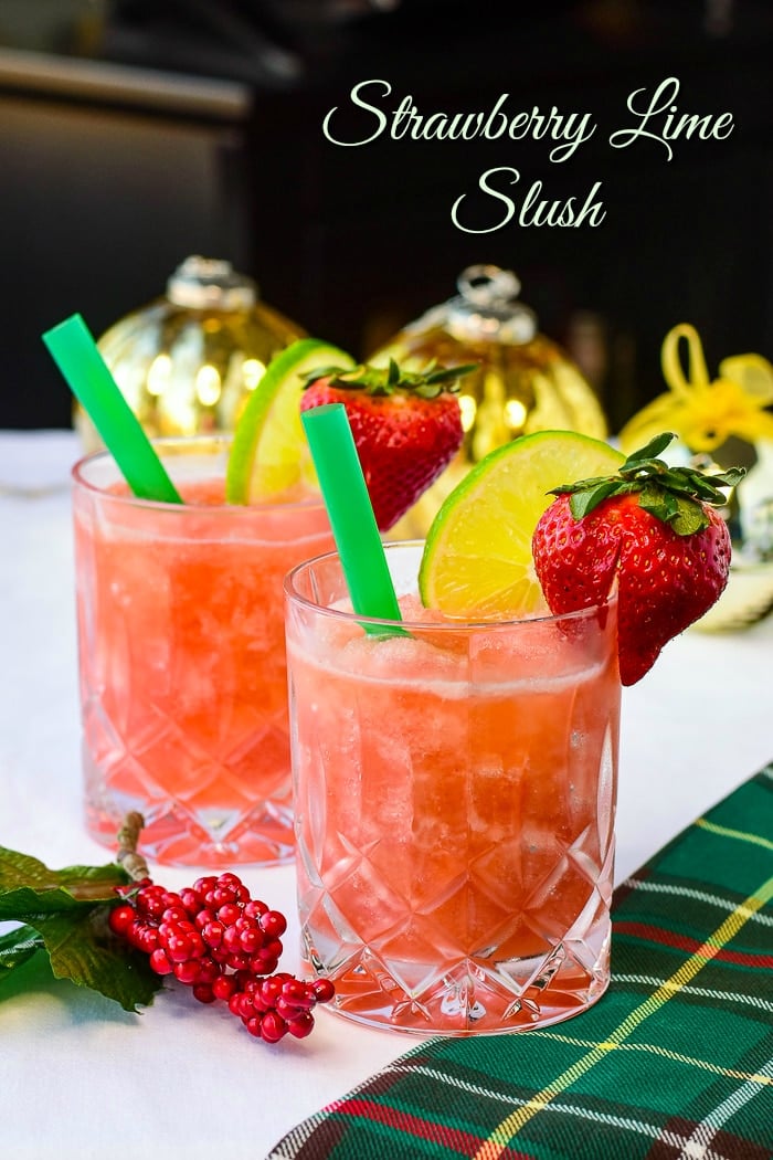 Strawberry Lime Slush shown with Christmas decorations and with title text added for Pinterest