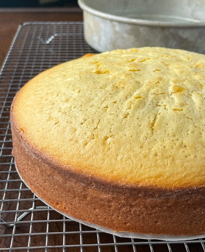 Condensed milk cake cooling on a wire rack