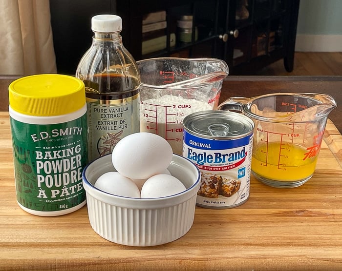 Photo of the 6 ingredients needed for condensed milk cake