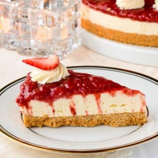 No Bake Strawberry Cheesecake close up photo of a single slice.