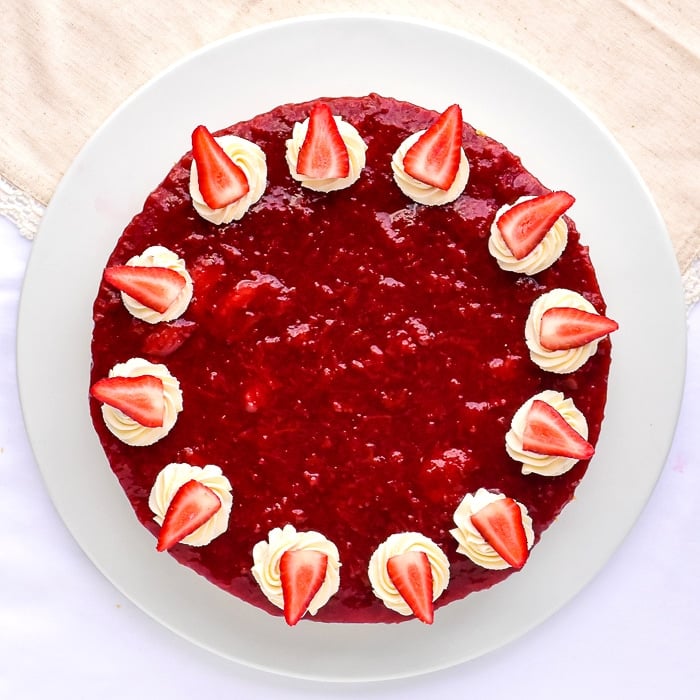 No Bake Strawberry Cheesecake overhead photo of uncut cake