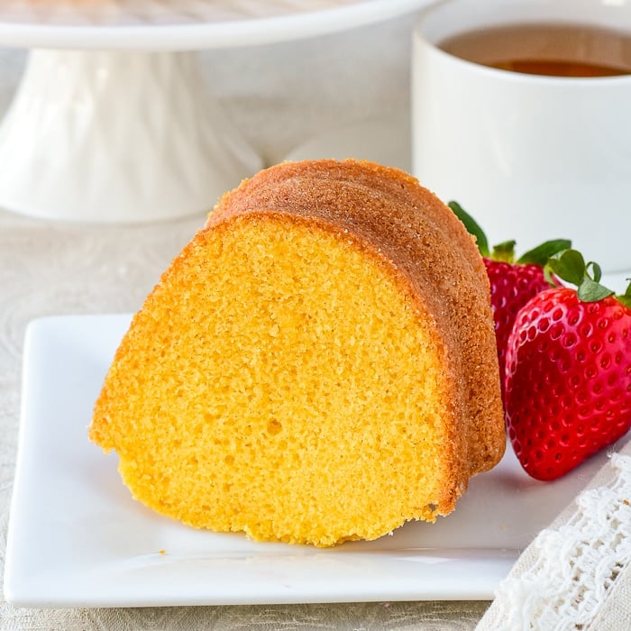 Close up photo of one slice of custard bundt cake