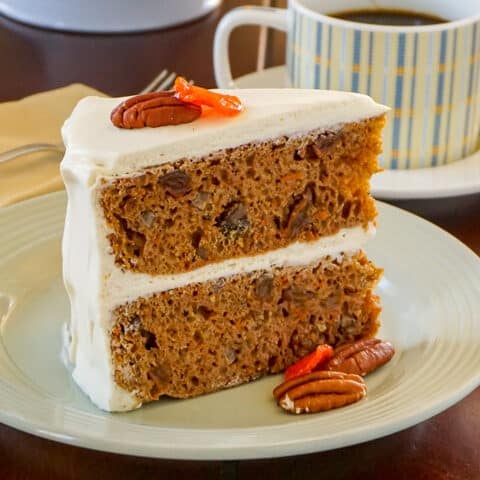 A slice of no added fat carrot cake on a white plate