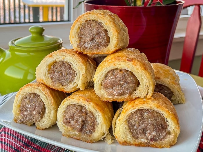 Italian Sausage Rolls in Parmesan Pastry wide shot photo