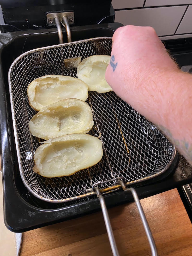 Frying the baked potato skins