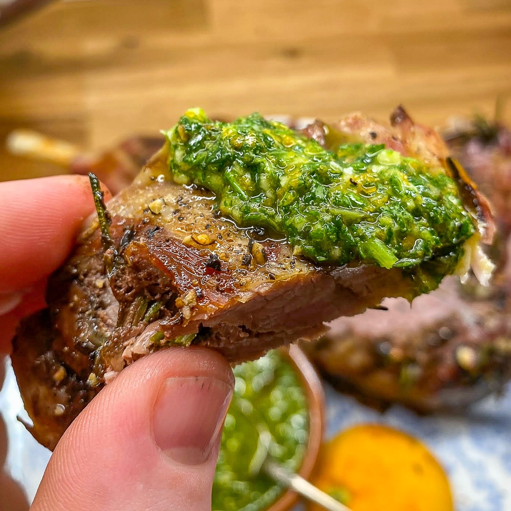 The first delicious bite of the roast leg of lamb