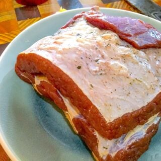 large piece uncooked salt beef