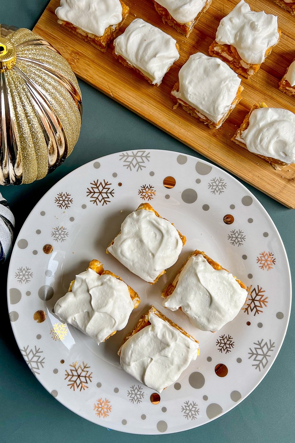 No Bake Winter White Cookies overhead photo on a Christmas themed plate