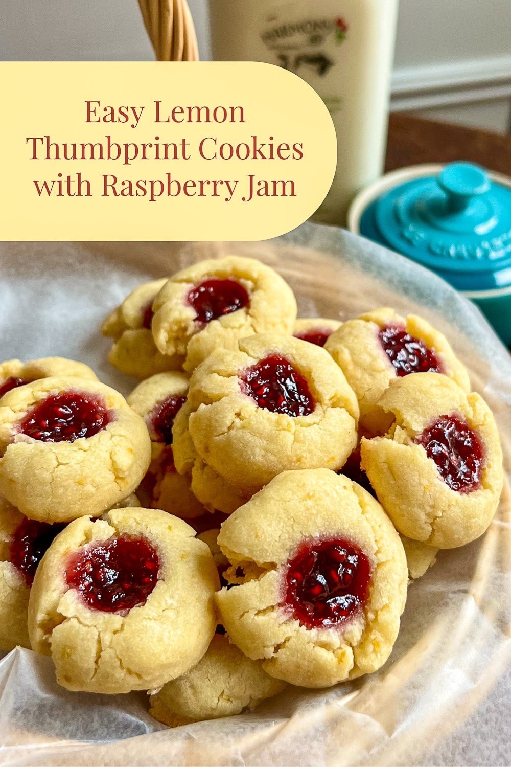Easy Lemon Thumbprint Cookies with raspberry jam with title text added for Pinterest