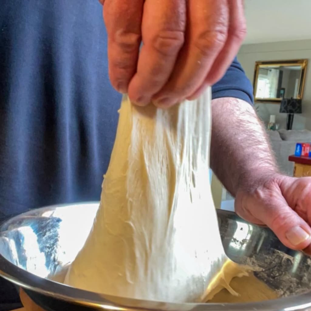 Continuing to stretch and fold dough