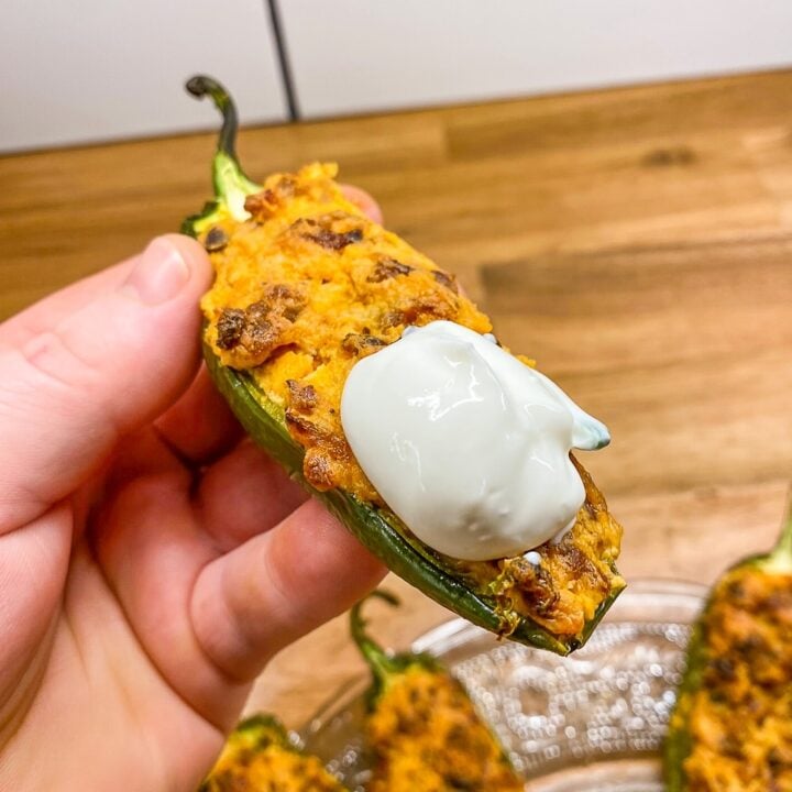 Chorizo Jalapeño Poppers close up image with sour cream