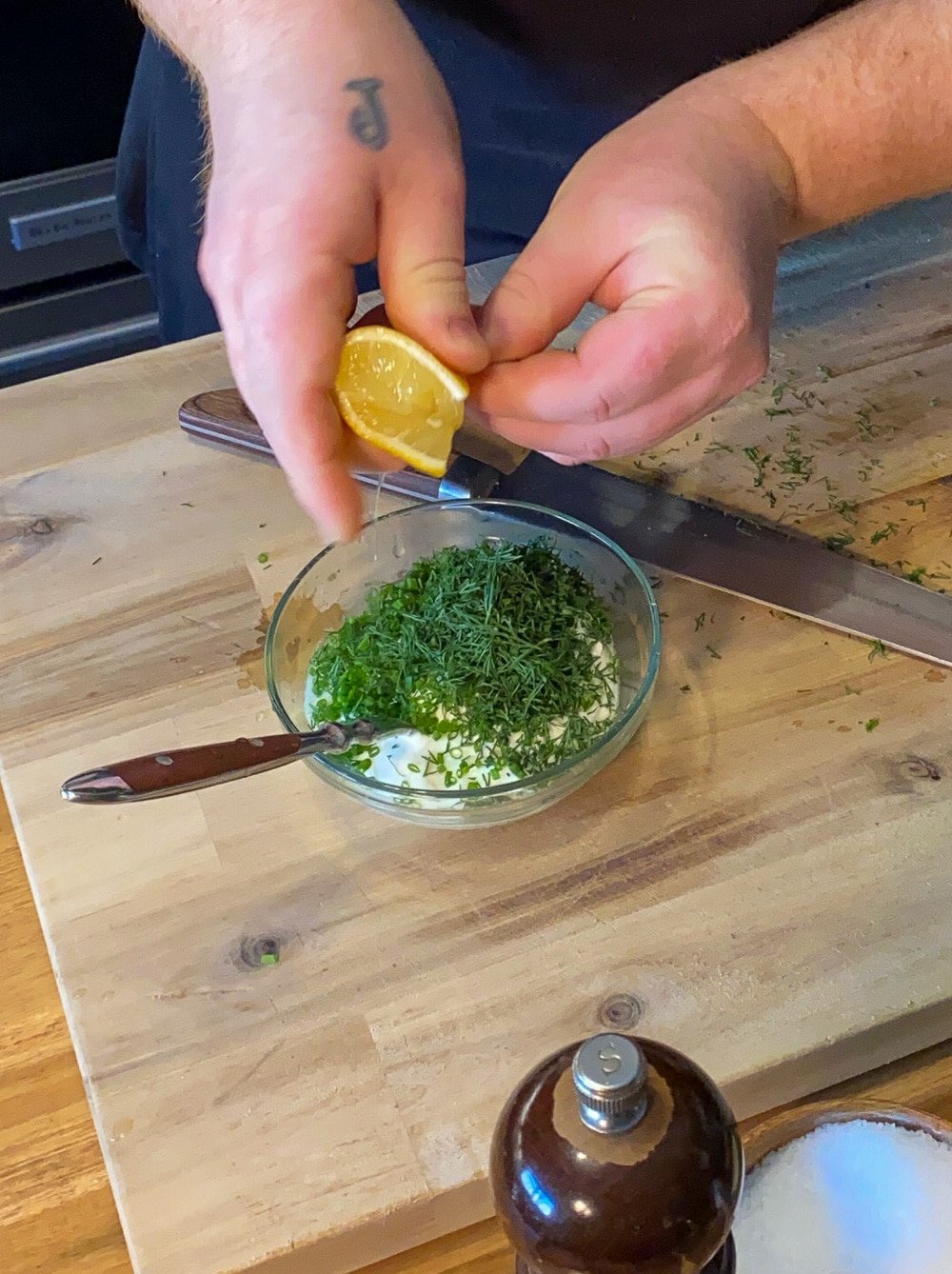 A squeeze of lemon for the herbed sour cream.