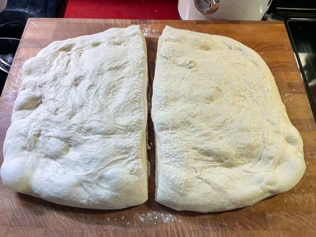 Dough cut in half to form 2 loaves.
