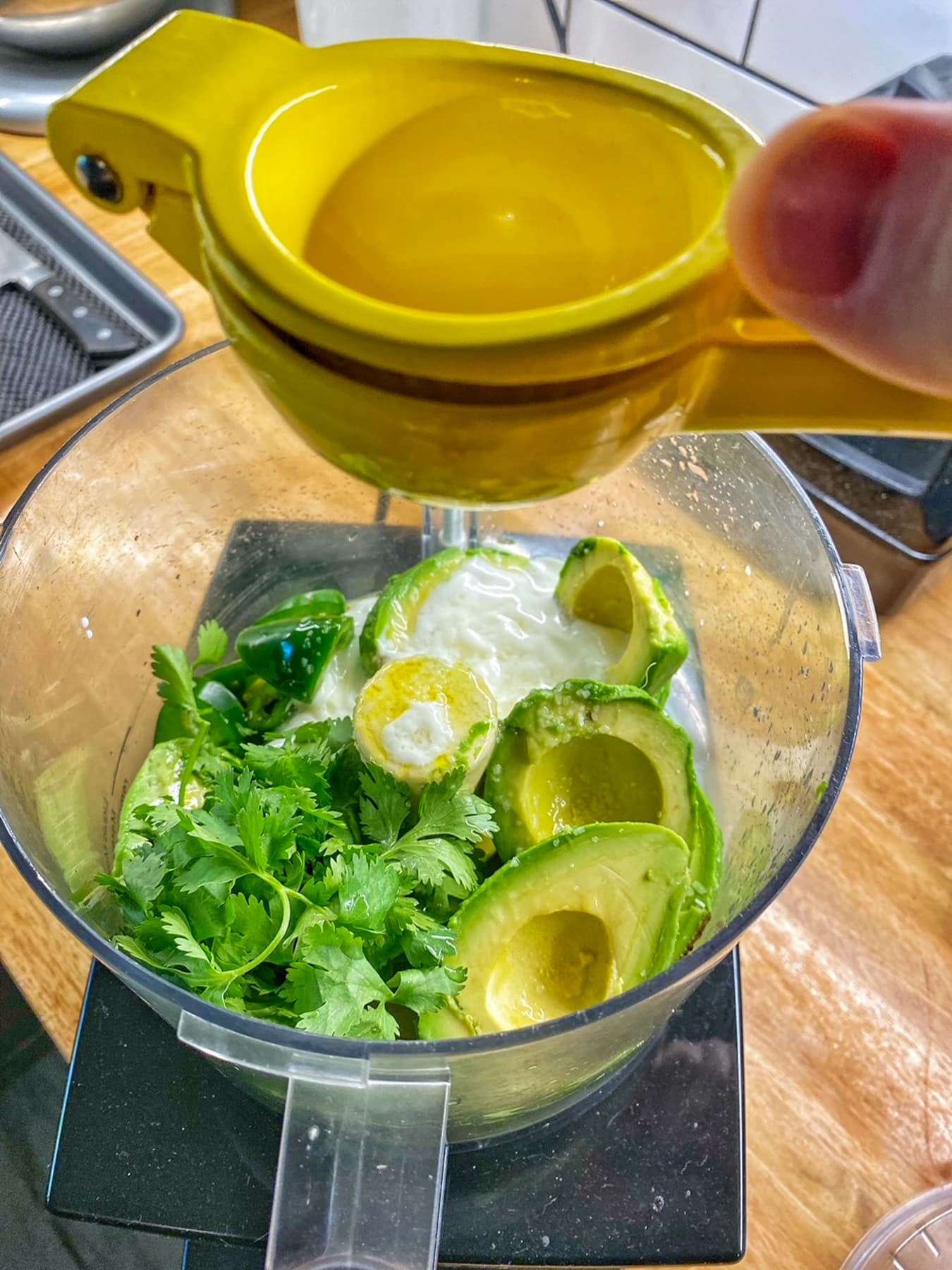 adding lime juice to the food processor