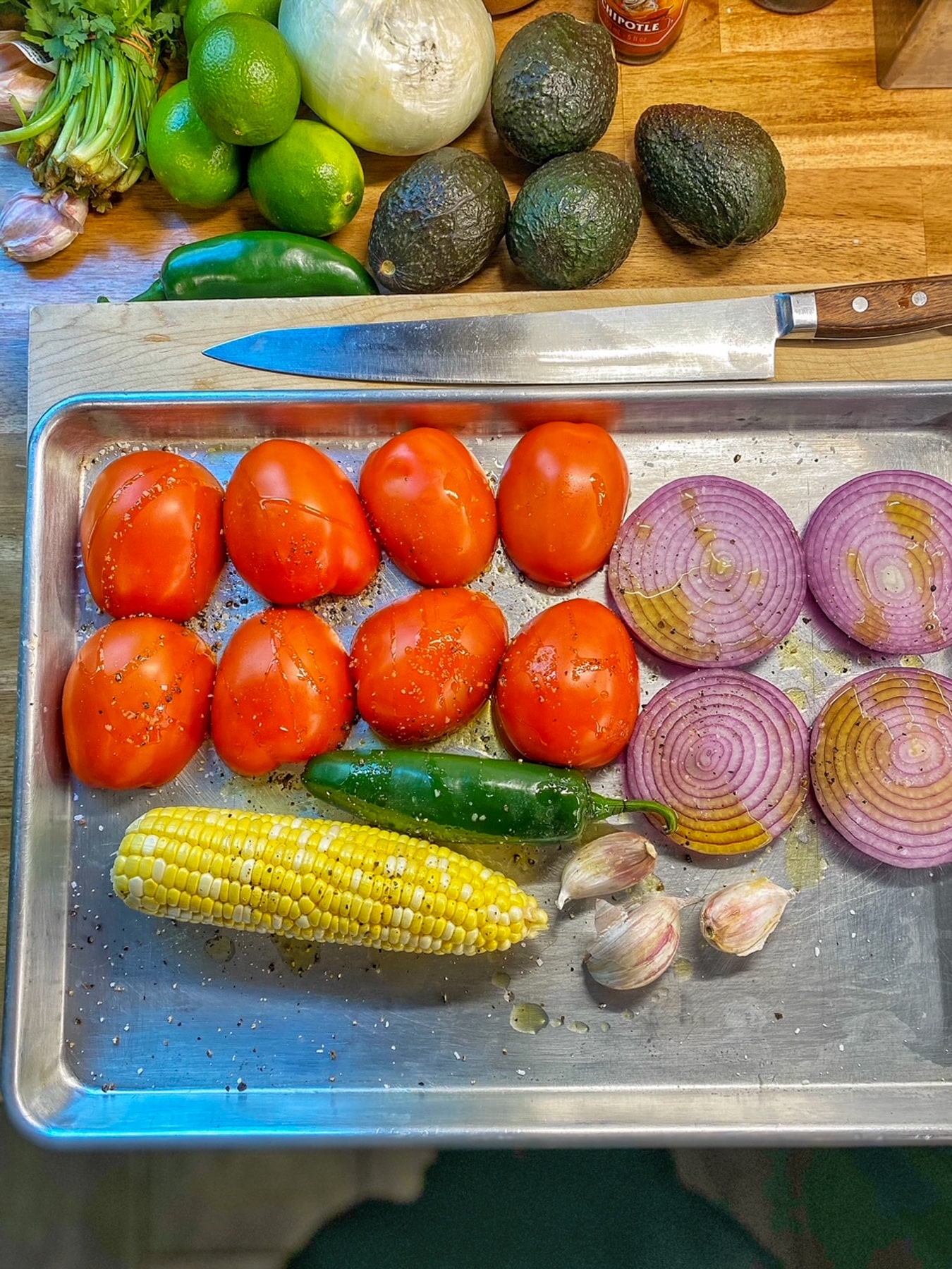 ingredients for grilled corn salsa on an aluminum tray