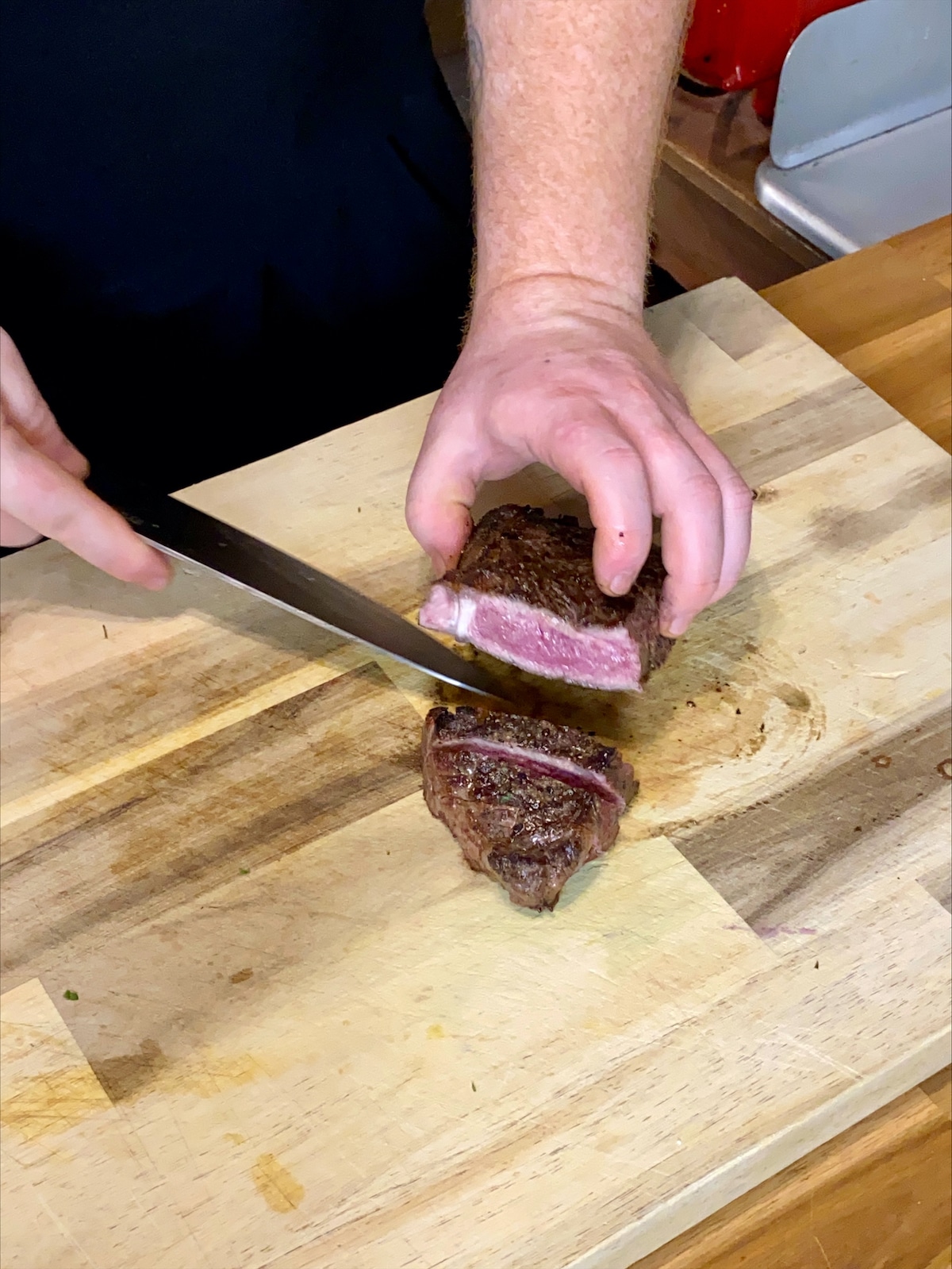 Slicing the rested steak for Surf & Turf Sharing Platter