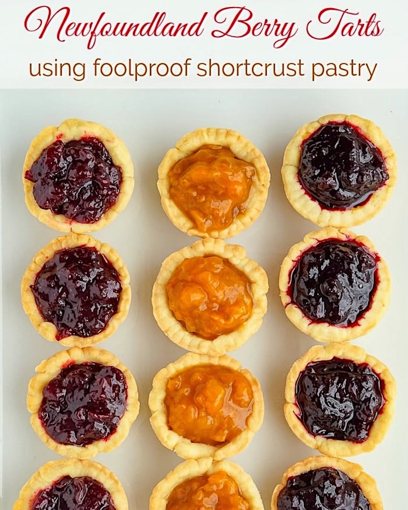 Jam Tarts topped with thick cream photo with title text added for social media.